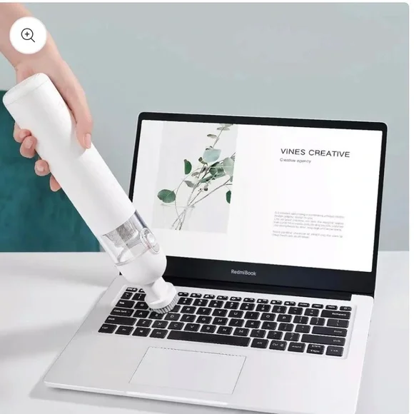 White handheld vacuum